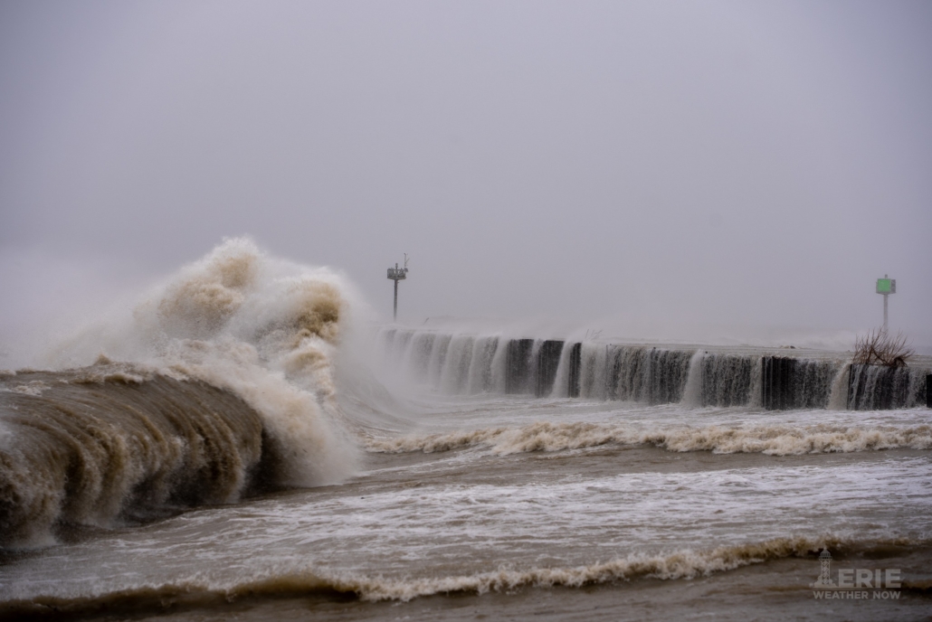 Strong storm waves crashing on Fostoria Ohio waterfront during severe weather.