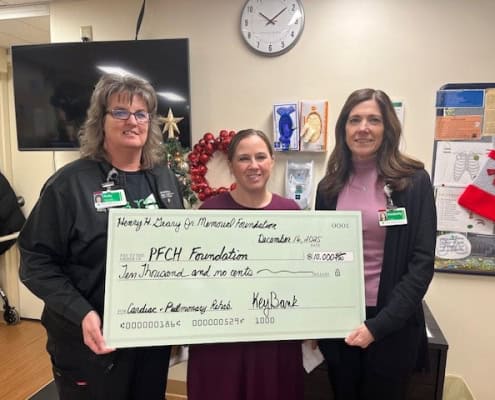 Detailed charity check presentation in Fostoria for medical fundraisers.