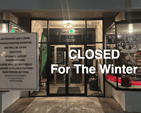 Empty storefront with "Closed for Winter" sign, Fostoria community news updates.