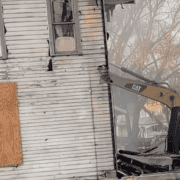 House fire damage, burnt home, Fostoria, Ohio, emergency response, property damage.