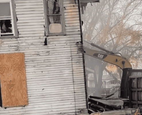 House fire damage, burnt home, Fostoria, Ohio, emergency response, property damage.