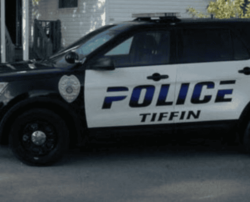 Police vehicle for Tiffin city police department with emergency lights.