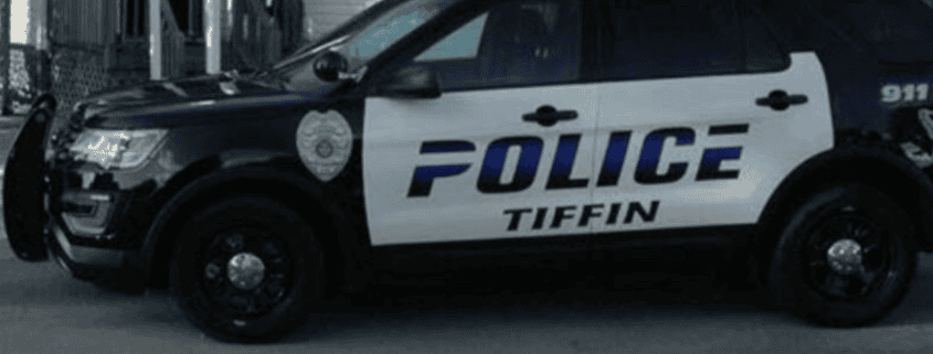 Police vehicle for Tiffin city police department with emergency lights.