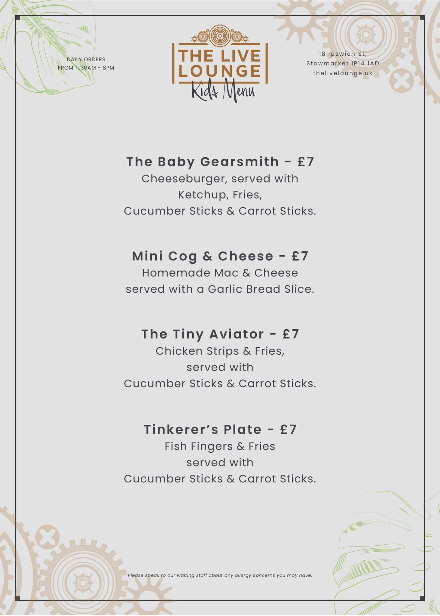 Crispy chicken strips with fries, served with cucumber and carrot sticks in a family-friendly setting at The Live Lounge.
