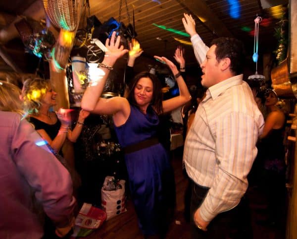Guests dancing at a corporate party with a party DJ