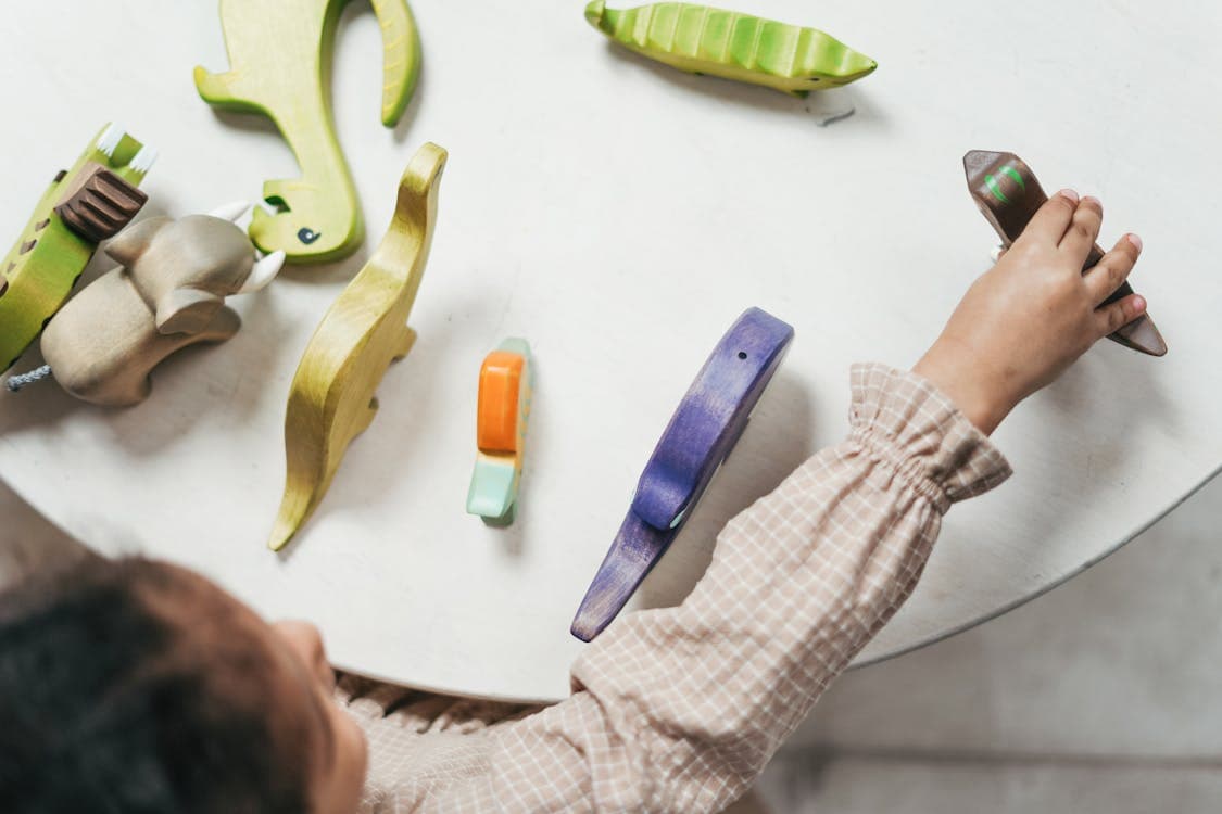 Child playing with toys during play therapy session in Sarasota FL