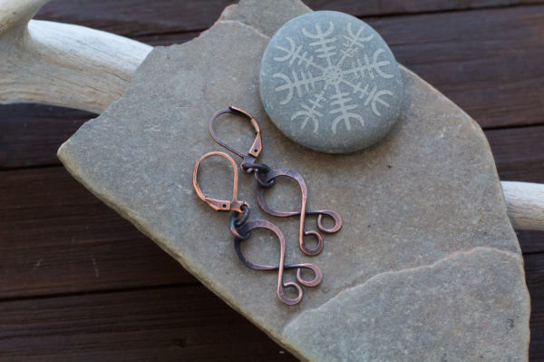 tiny troll cross earrings