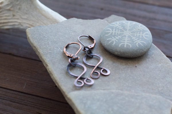 tiny troll cross earrings