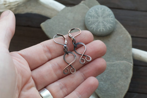 tiny troll cross earrings