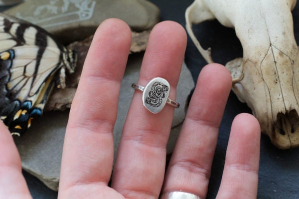 loki ring urnes snakes