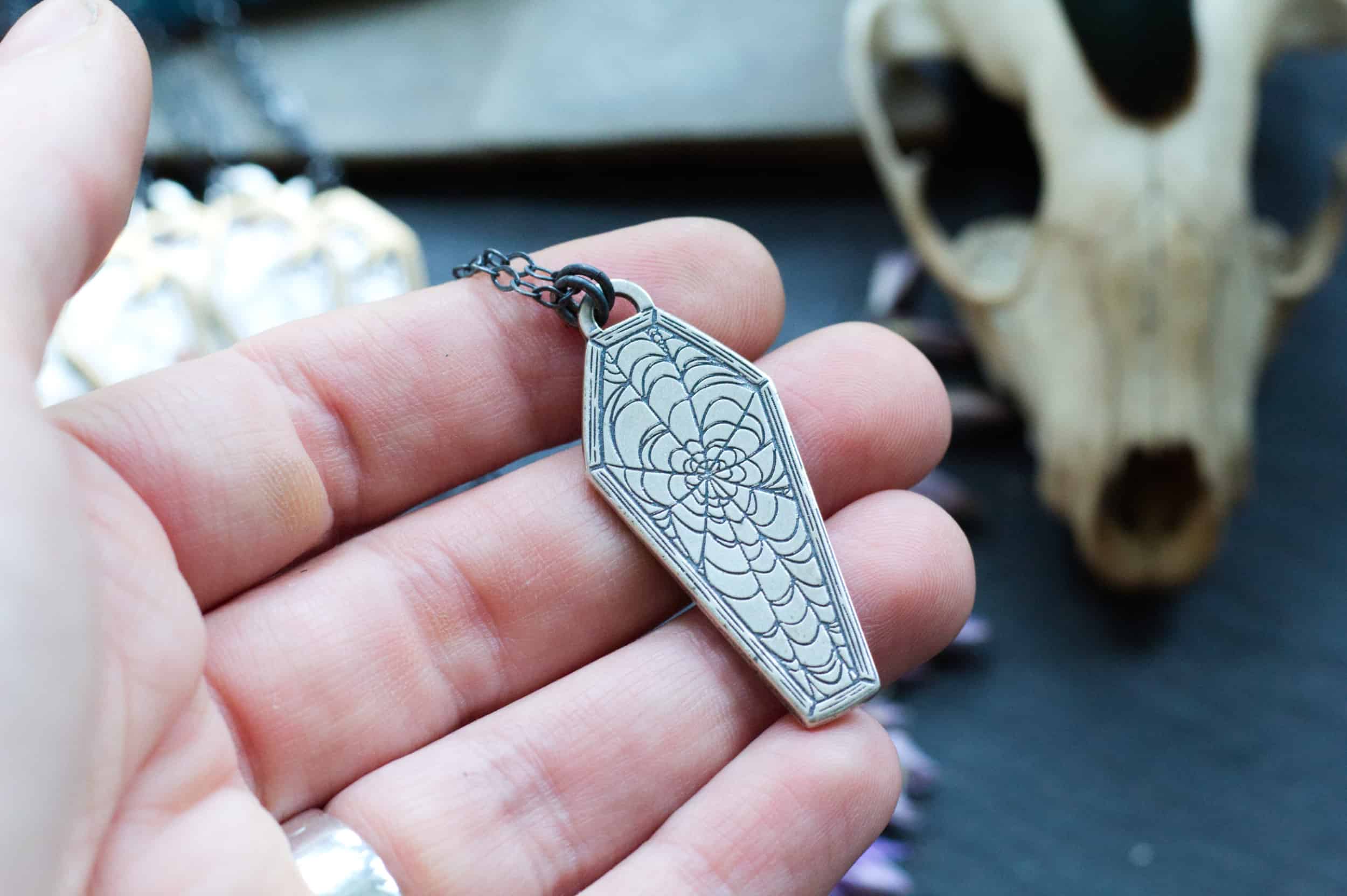 halloween coffin pendant with jack o lanterns