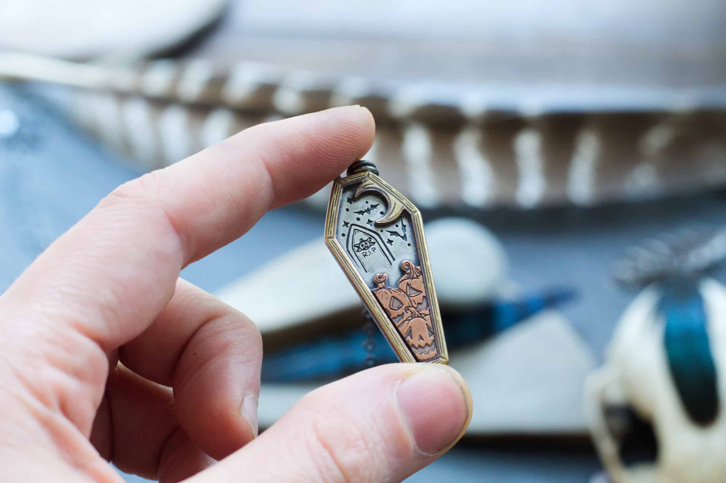 halloween coffin pendant with jack o lanterns