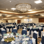 Ballroom with chandeliers and tables decorated for an event