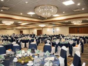 Ballroom with chandeliers and tables decorated for an event