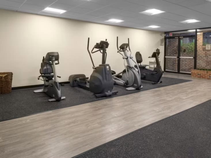 Fitness center with a variety of exercise machines.