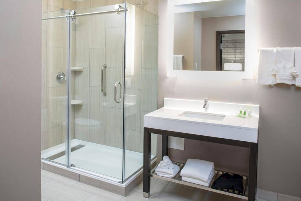 Bathroom with shower and sink. Gallery Image