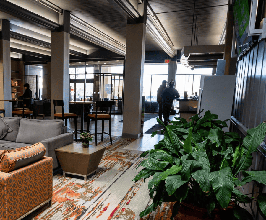 View from the seating area, looking towards the main entrance and front desk. Gallery Image