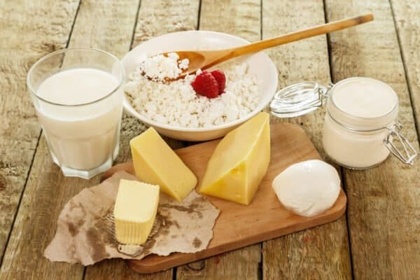 Different dairy products on the wooden table