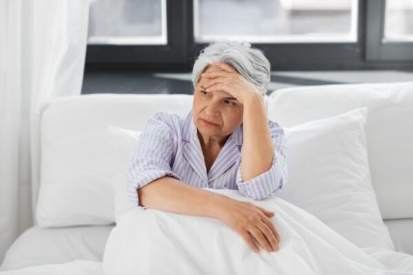 Older woman struggling with quality of sleep