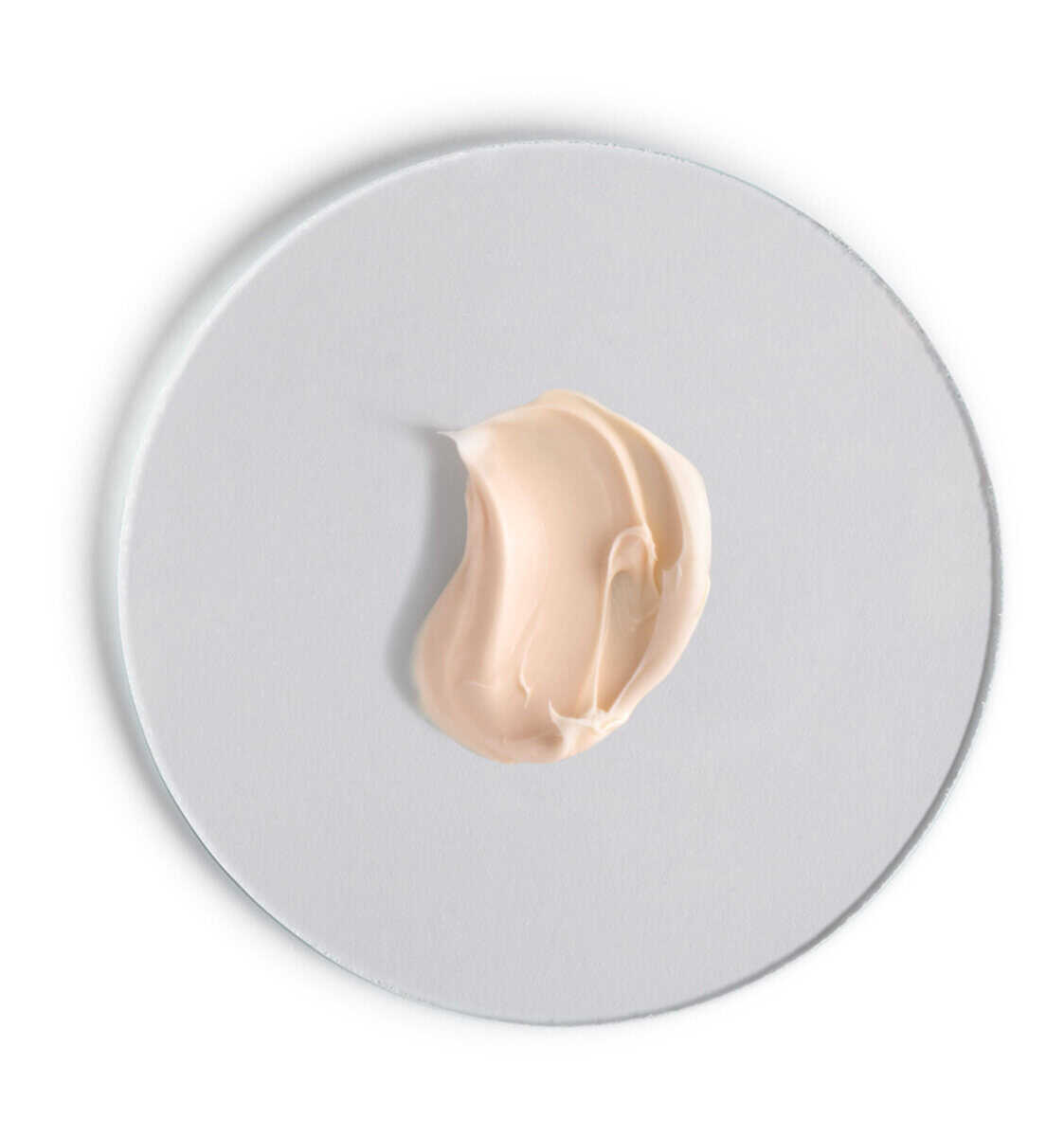 Cream swatch on a white background.