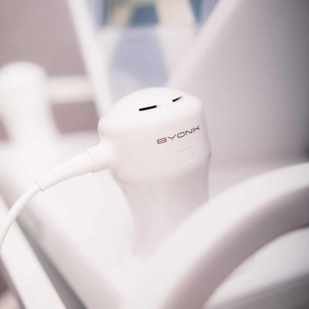 Modern facial treatment device at Tonic Day Spa for skin rejuvenation.