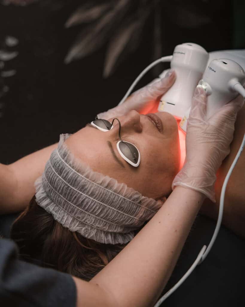 Woman receiving a chemical peel facial treatment at Tonic Day Spa.