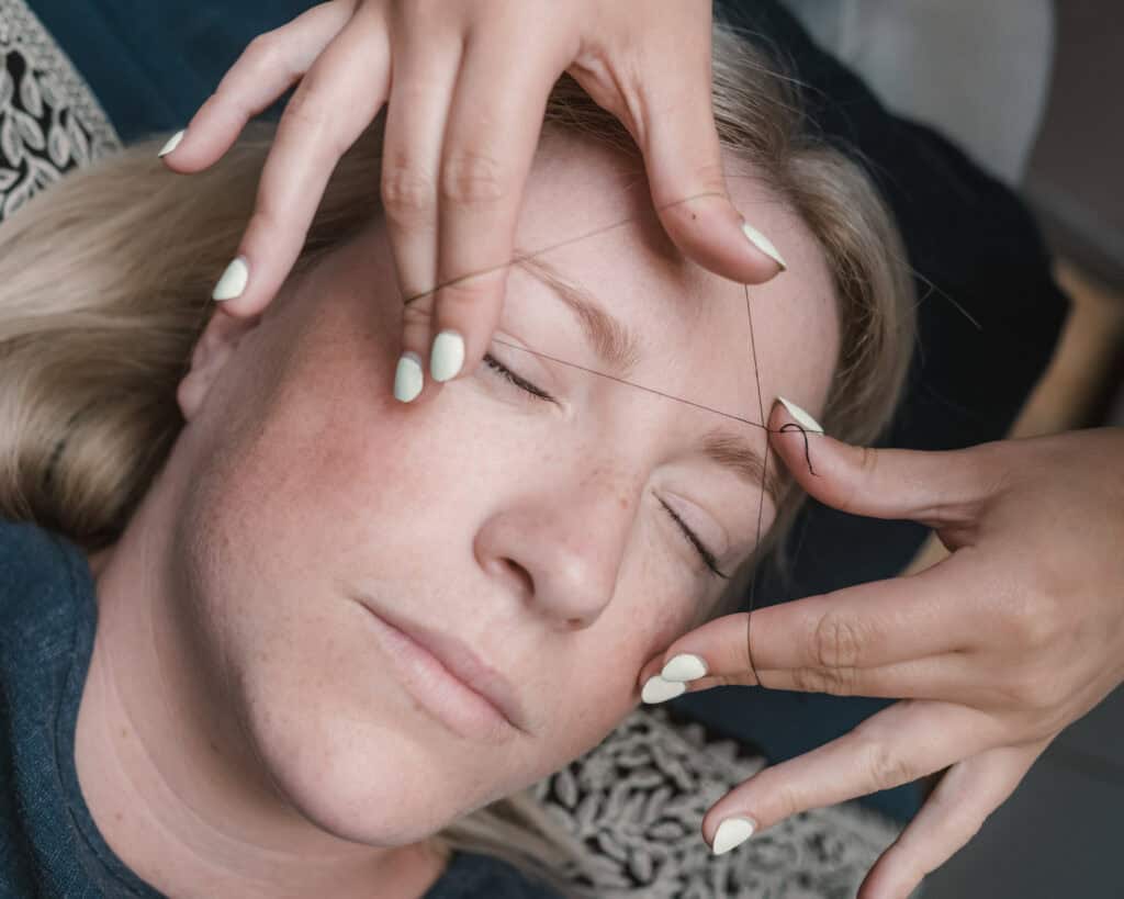 Acupuncture facial therapy for skin rejuvenation and relaxation.