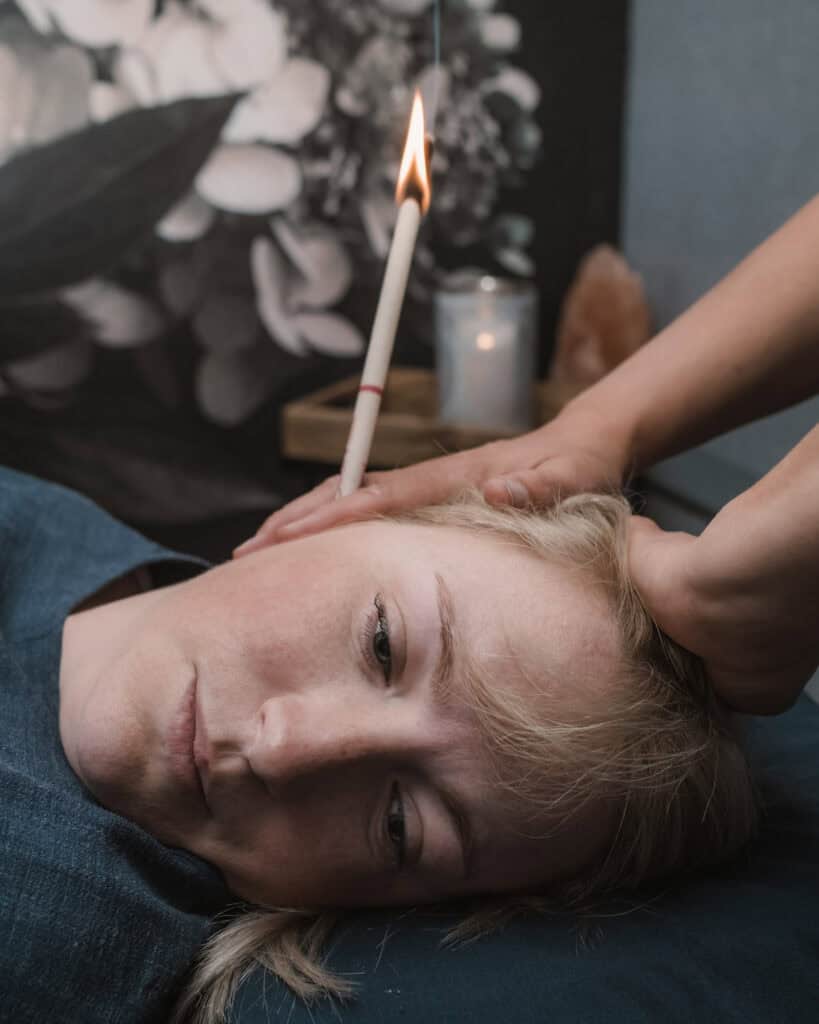 Relaxing holistic therapy with candlelight for stress relief and relaxation.