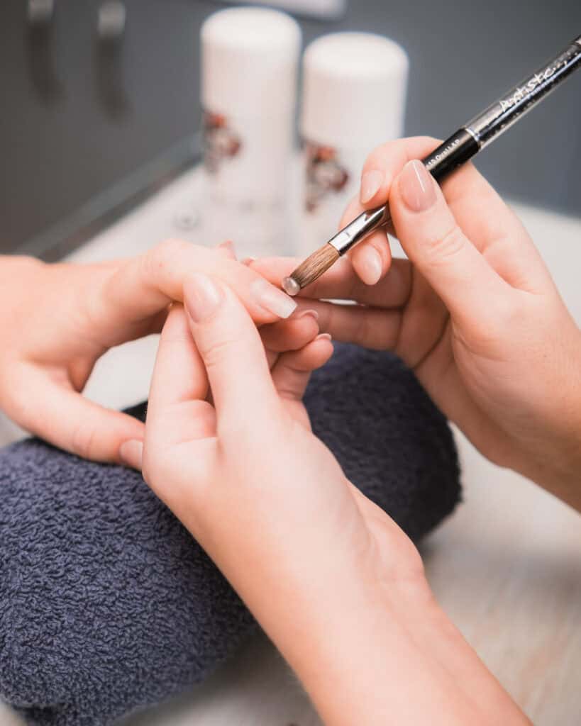 Professional nail art being applied during a beauty treatment at Tonic Day Spa.