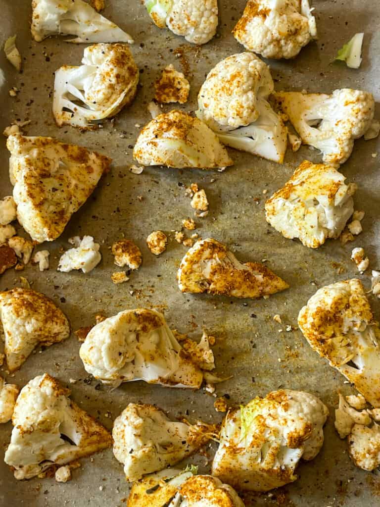 roasted cauliflower on baking sheet pan.