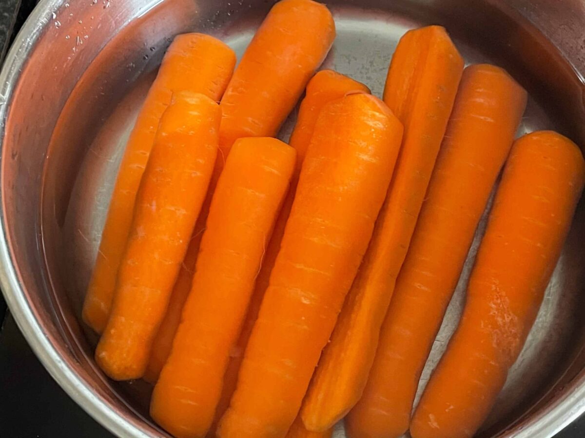carrot hotdogs in the saucepan ready to cook.