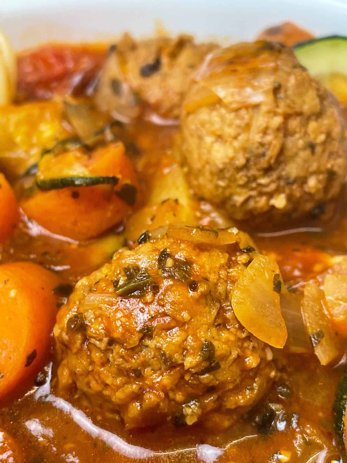 Close up of vegan meatball Mexican soup.