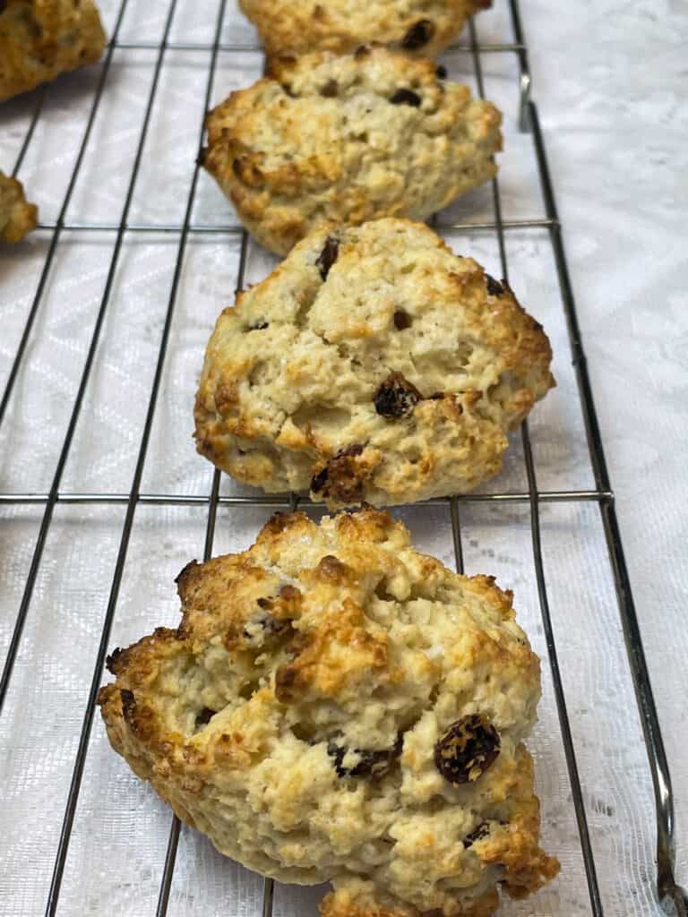 vegan Jamaican rock buns on wire rack cooling.
