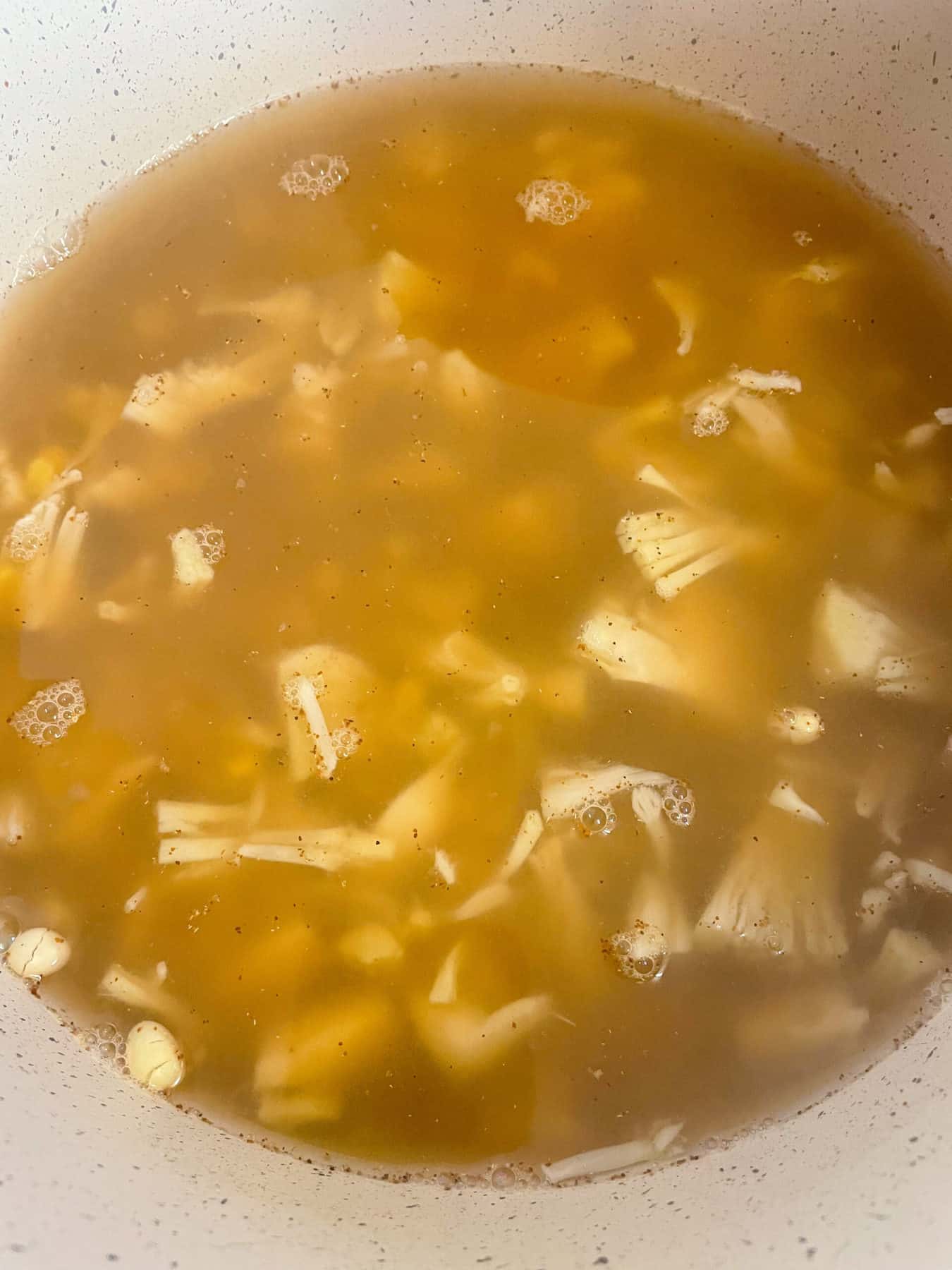 Stock poured into the soup pot.