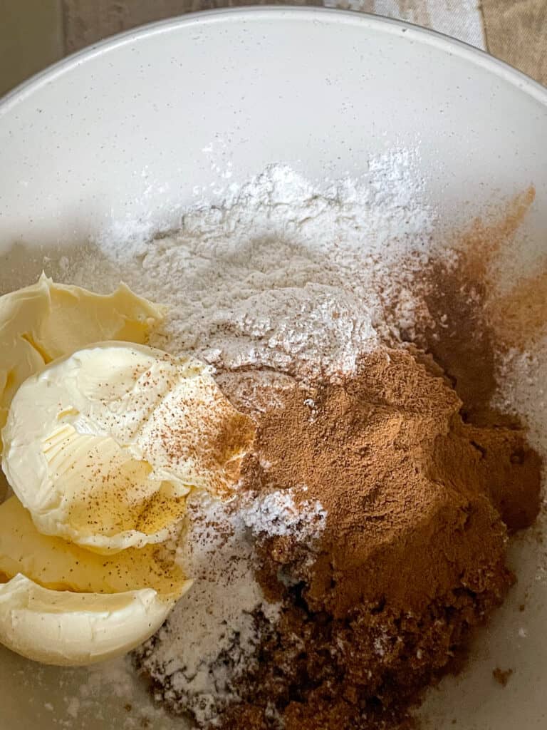streusel topping ingredients added to small bowl.