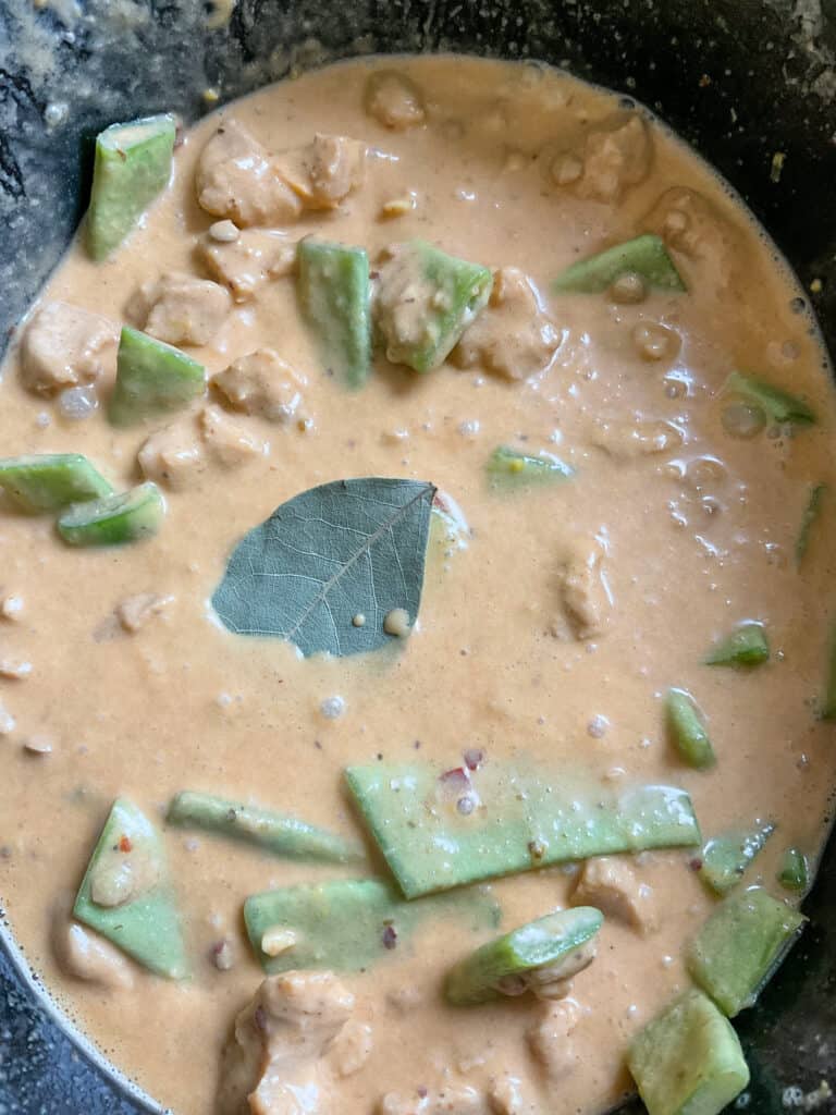 Veggie stock mixed through curry ingredients and ready to cook.