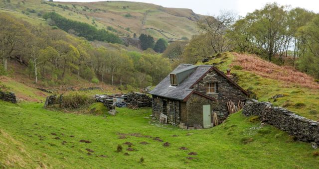 Image of old Welsh cottage sourced from Canva Pro.