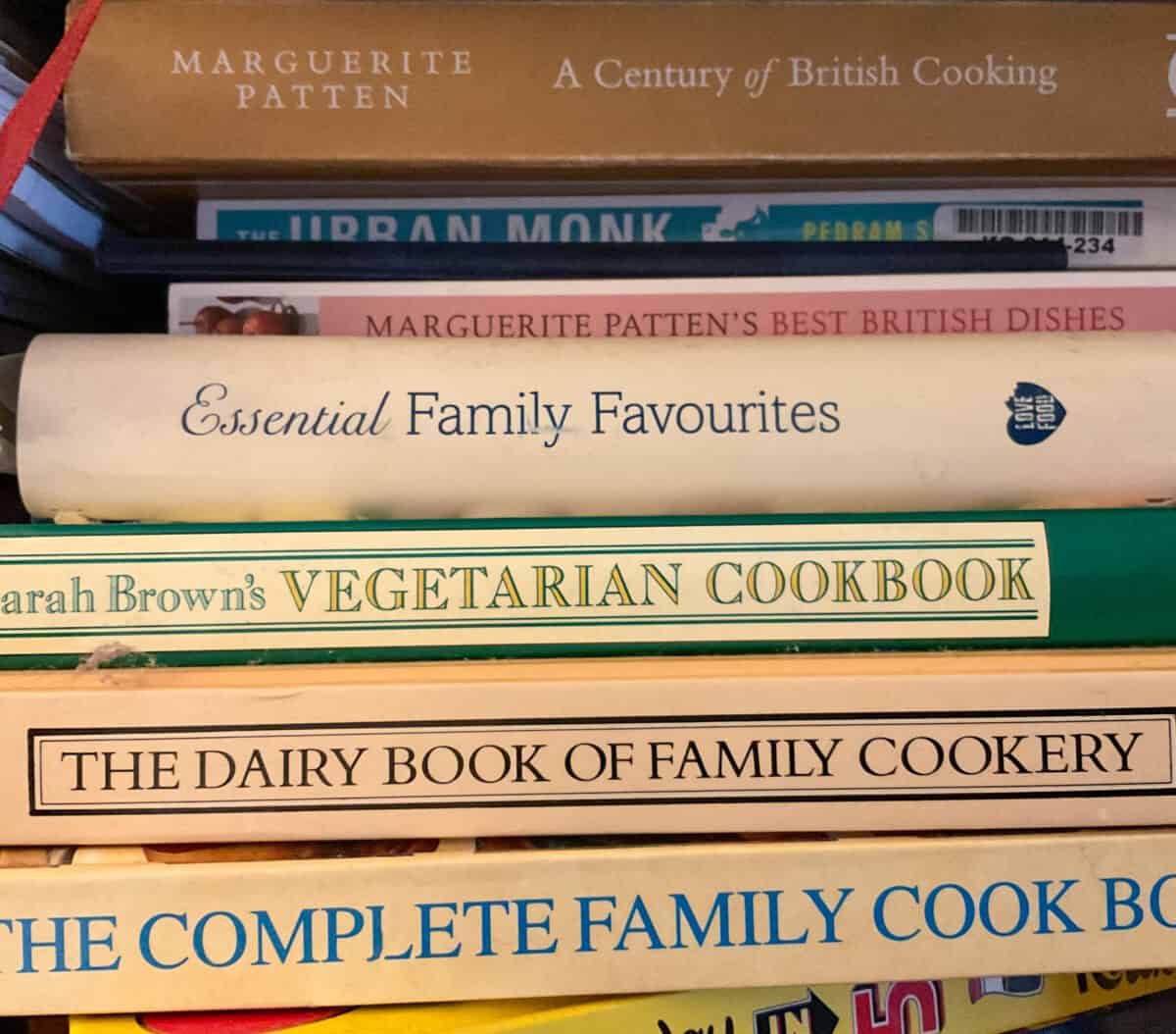 A pile of traditional family cookery books.
