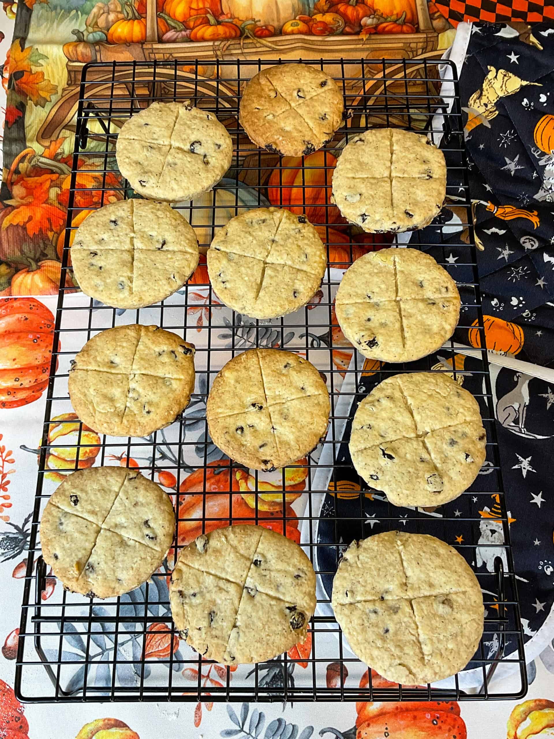 Soul cakes cooling on a cooling rack.