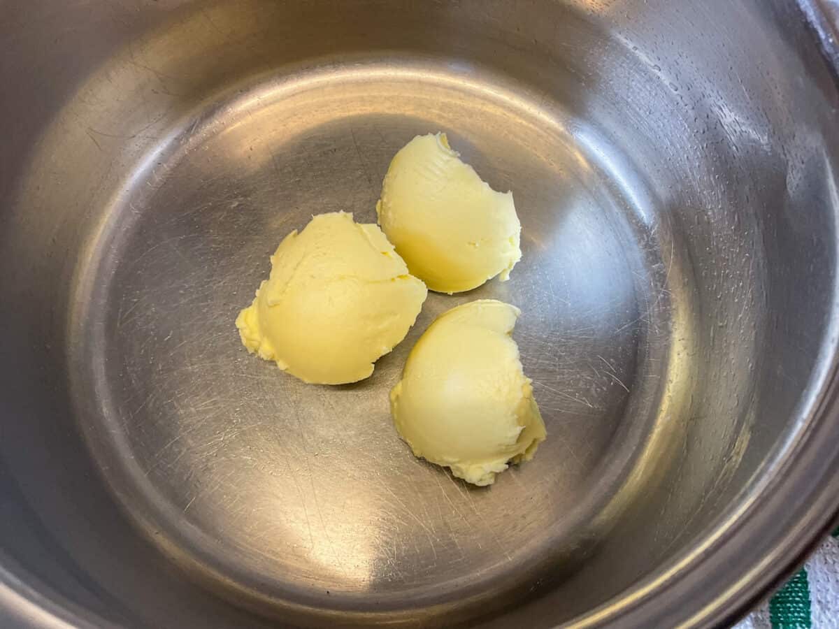 Butter in saucepan.