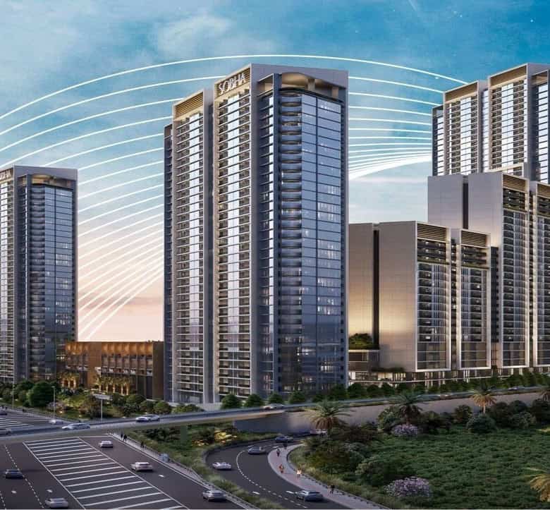 Luxurious modern high-rise residential buildings with sleek glass facades set against a vibrant sky.