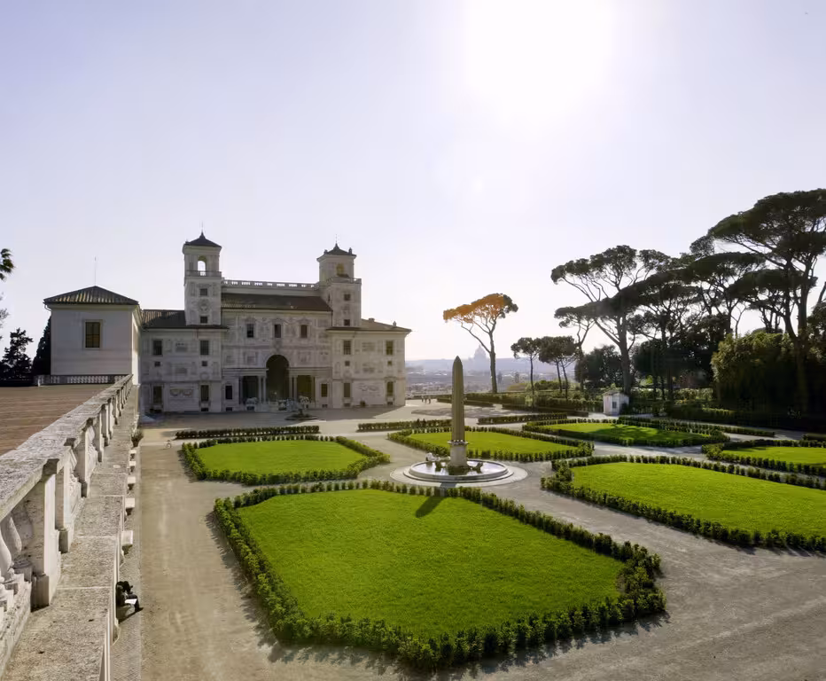 Renaissance villa with formal gardens and pine trees