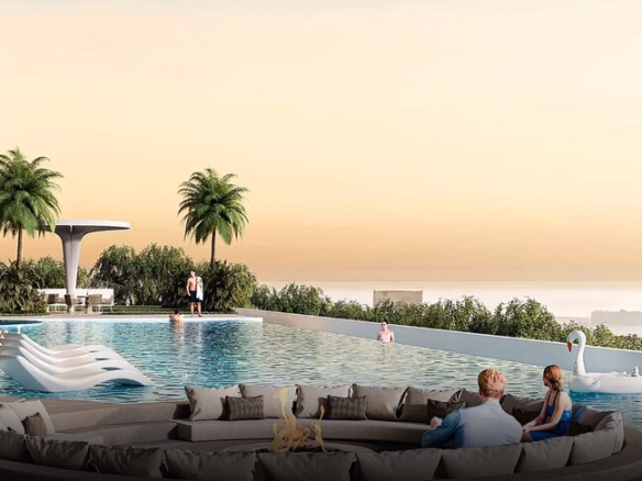 Luxurious rooftop pool with relaxing guests and ocean view.