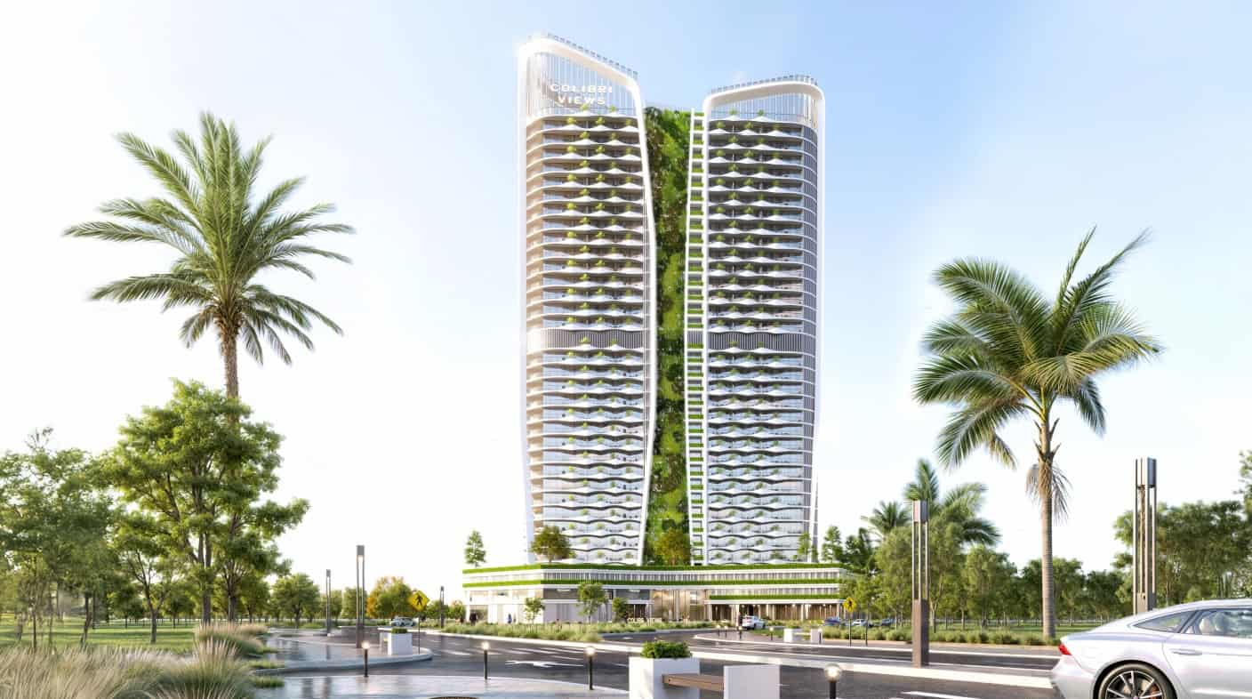 Luxurious twin skyscrapers with modern glass facades and lush green terraces, set in landscaped surroundings, representing upscale Italian real estate in a prime city location.