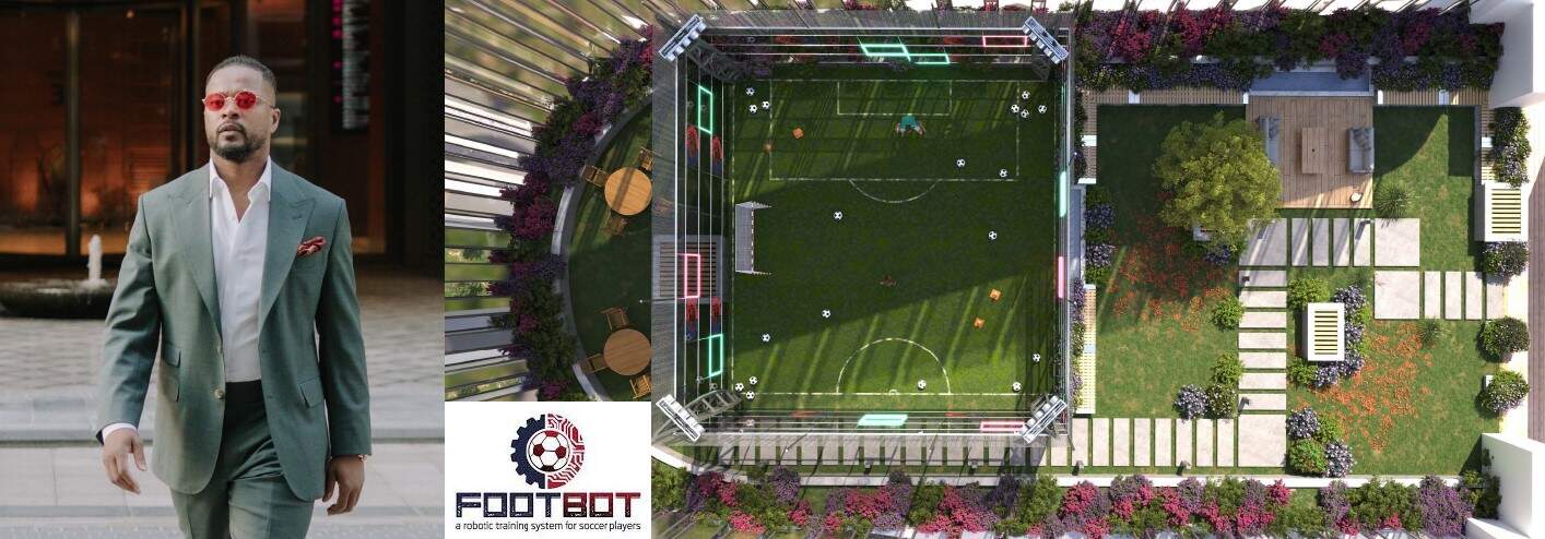 Modern man in a stylish suit walking near fountains on a city street.