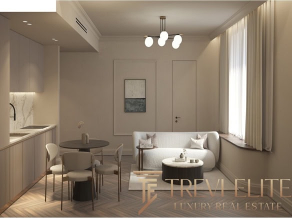 Elegant modern living space featuring neutral tones, contemporary furniture, and ample natural light in an upscale Italian property by Trevi Elite.