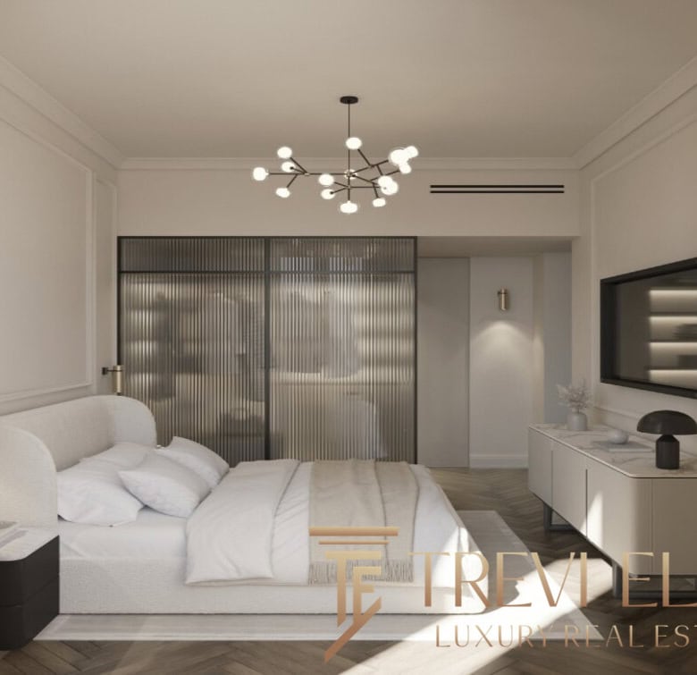 Luxurious modern bedroom with minimalist decor, elegant lighting fixtures, and a stylish media console, showcasing high-end Italian real estate by Trevi Elite.
