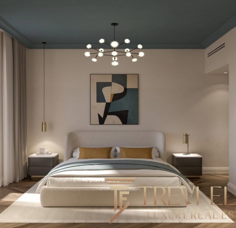 Elegant master bedroom with modern decor, soft lighting, and stylish furnishings in an upscale Italian property by Trevi Elite.