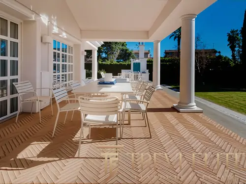 Modern designer villa in Casalpalocco, Rome, featuring avant-garde architecture, private pool, and lush garden.