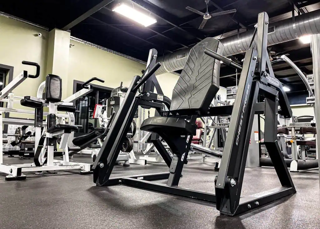Plate-loaded chest press machine at Triangle Fitness in North Carolina.
